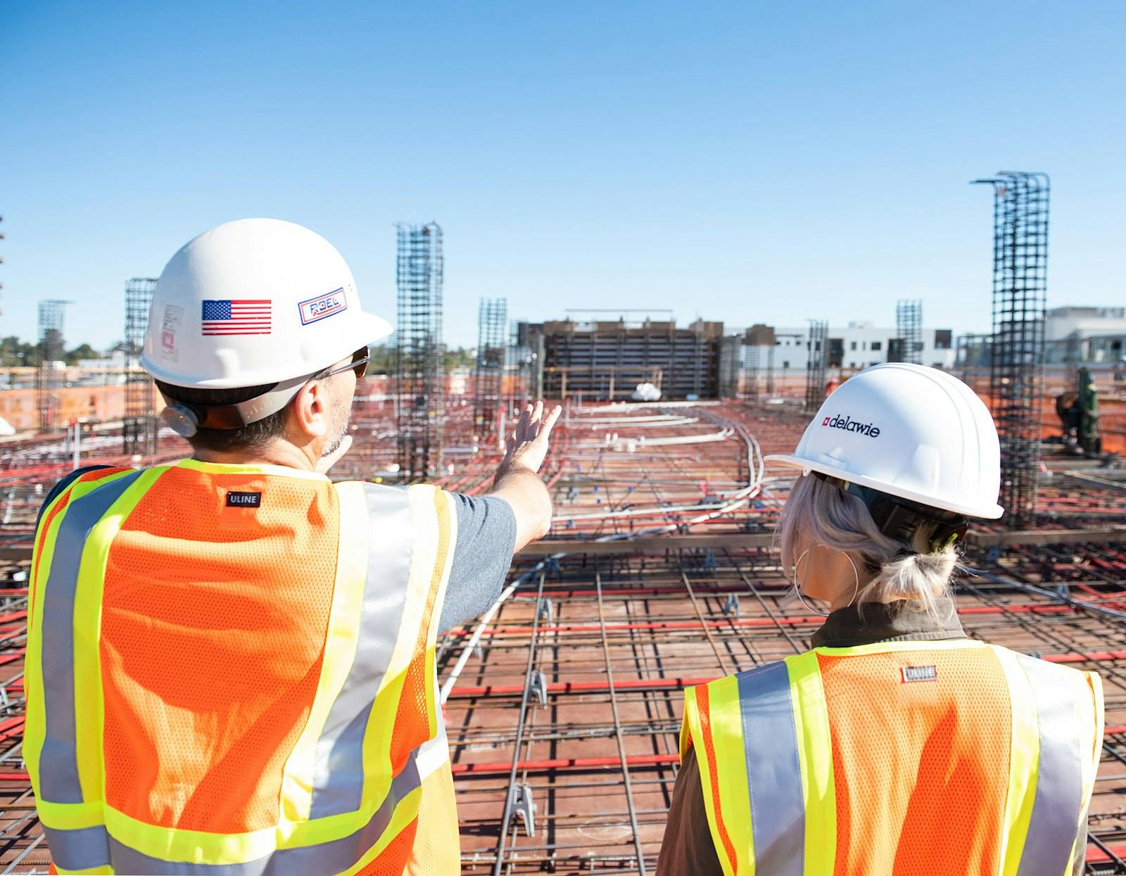 Site managers reviewing progress on a construction site